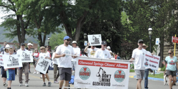 Members of the Glenwood Springs Citizens' Alliance march in the 2022 Strawberry Days Parade.