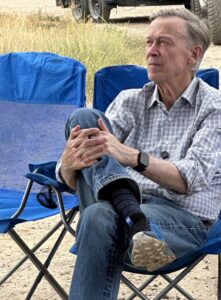 U.S. Sen. John Hickenlooper listens to community leaders talk about the risks posed by the limestone mine expansion.